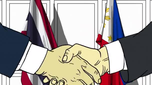 Empresarios o políticos se dan la mano contra las banderas de Tailandia y Filipinas. Reunión oficial o animación de dibujos animados relacionados con la cooperación — Vídeo de stock