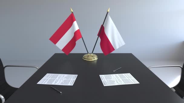 Bayraklar, Avusturya ve Polonya ve kağıtları masaya. Müzakereler ve uluslararası bir anlaşma imzalama. Kavramsal 3d animasyon — Stok video