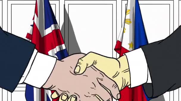 Empresarios o políticos se dan la mano contra las banderas de Gran Bretaña y Filipinas. Reunión oficial o animación de dibujos animados relacionados con la cooperación — Vídeo de stock