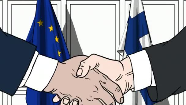 Підприємці або політиків потиснути один одному руки проти прапори Європейському Союзі ЄС і Фінляндія. Офіційна зустріч або співпраці пов'язані з мультфільму анімації — стокове відео