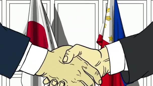 Podnikatelé či politici potřást rukou proti vlajkami Japonska a Filipíny. Oficiální setkání nebo spolupráci související kreslené animace — Stock video