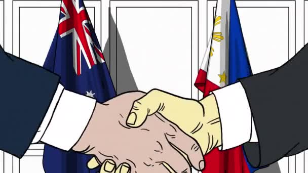 Uomini d'affari o politici stringono la mano contro le bandiere di Australia e Filippine. Riunione ufficiale o animazione animata correlata alla cooperazione — Video Stock