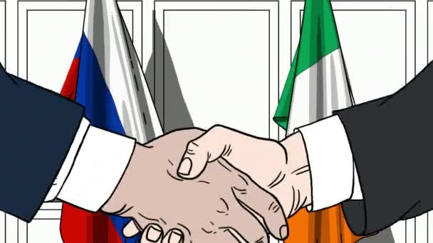 Des hommes d'affaires ou des politiciens serrent la main contre les drapeaux de la Russie et de l'Irlande. Réunion officielle ou animation de bande dessinée liée à la coopération — Video
