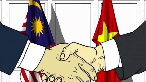 Pebisnis atau politisi berjabat tangan melawan bendera Malaysia dan Vietnam. Pertemuan resmi atau animasi kartun terkait kerja sama — Stok Video