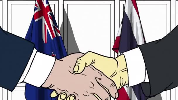 Uomini d'affari o politici stringono la mano contro le bandiere della Nuova Zelanda e della Thailandia. Riunione ufficiale o animazione animata correlata alla cooperazione — Video Stock