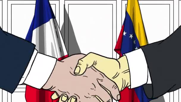 Biznesmenów i polityków uścisnąć dłoń przed flagi Francji i Wenezueli. Oficjalne spotkanie lub współpracy z filmów animowanych — Wideo stockowe