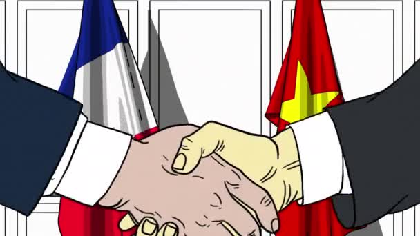 Uomini d'affari o politici stringono la mano contro le bandiere di Francia e Vietnam. Riunione ufficiale o animazione animata correlata alla cooperazione — Video Stock