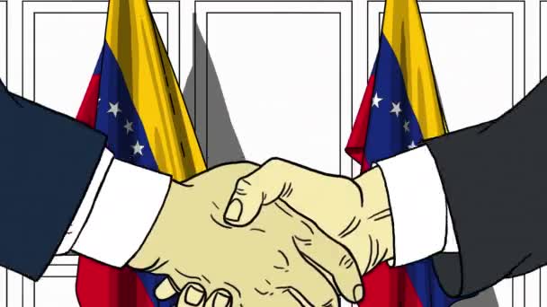 Empresários ou políticos apertam as mãos contra bandeiras da Venezuela. Reunião oficial ou animação de desenhos animados relacionados com a cooperação — Vídeo de Stock