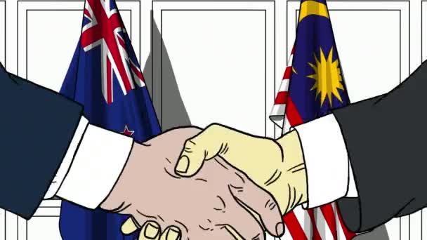 Businessmen or politicians shake hands against flags of New Zealand and Malaysia. Official meeting or cooperation related cartoon animation — Stock Video