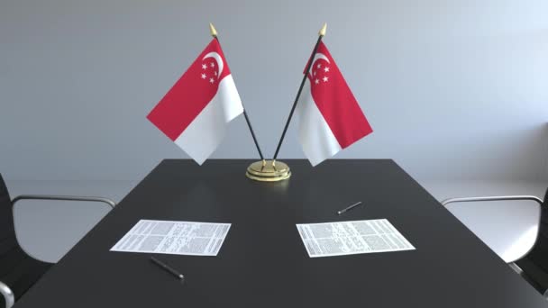 シンガポールの国旗し、テーブルの上の論文。交渉をし、契約を締結します。概念の 3 d アニメーション — ストック動画