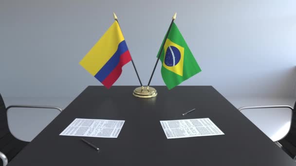 桌子上的旗帜和文件 谈判和签署合同 概念3D — 图库视频影像