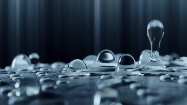 Slow motion abstract shot of beautiful surreal water drops falling down — Stock Video