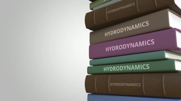 Назва HYDRODYNAMICS на стосі книг, концептуальна циклічна 3D анімація — стокове відео