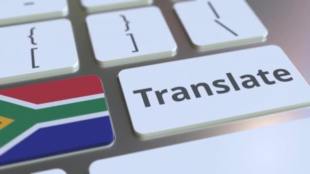 TRANSLATE text and flag of South Africa on the buttons on the computer keyboard. Conceptual 3D animation — Stock Video