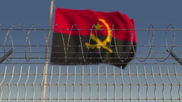 在铁丝网后面, 安哥拉的旗帜发红。可循环3d 动画 — 图库视频影像