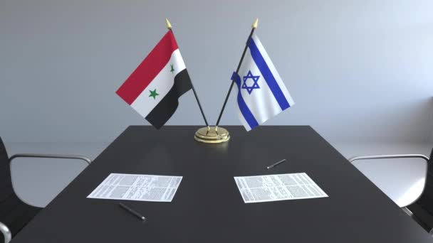 Bendera Suriah dan Israel dan kertas di atas meja. Negosiasi dan penandatanganan perjanjian internasional. Animasi 3D konseptual — Stok Video