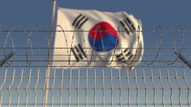 Arame farpado contra a bandeira ondulada da Coreia do Sul. Loopable animação 3D — Vídeo de Stock