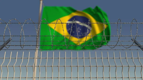 Колючая проволока против размахивающего флагом Бразилии. 3D рендеринг — стоковое фото
