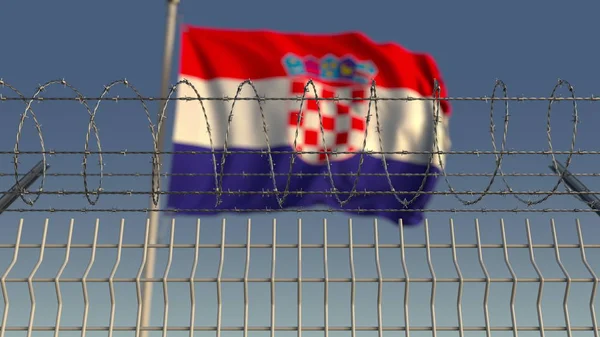 Размытый флаг Хорватии за забором из колючей проволоки. 3D рендеринг — стоковое фото