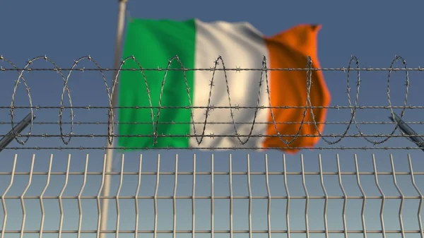 在铁丝网后面挥舞着爱尔兰国旗的国防。3d 渲染 — 图库照片