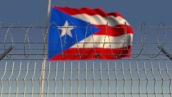 Drapeau flou agitant Puerto rico derrière une clôture en fil de fer barbelé. rendu 3D — Photo