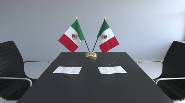 Banderas de México y papeles sobre la mesa. Negociaciones y firma de un acuerdo. Renderizado 3D conceptual —  Fotos de Stock