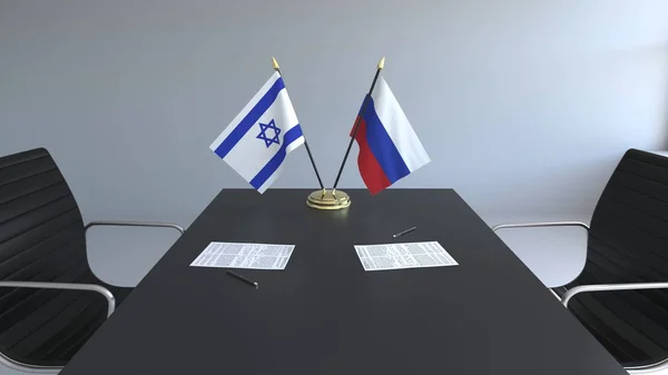 Прапори Ізраїлю та Росії і документи на столі. Переговорів і підписання міжнародного договору. Концептуальна 3d-рендерінг — стокове фото