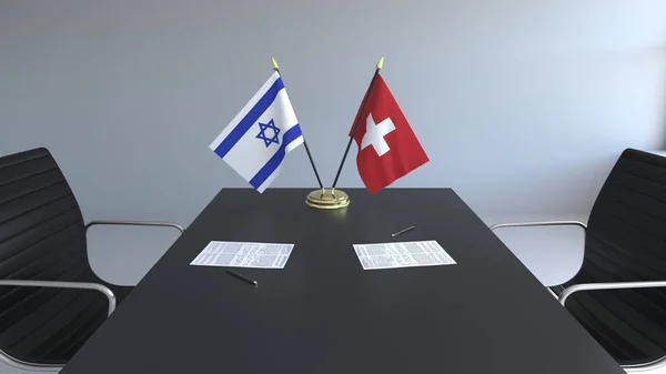 Drapeaux d'Israël et de Suisse et papiers sur la table. Négociations et signature d'un accord international. rendu 3D conceptuel — Photo