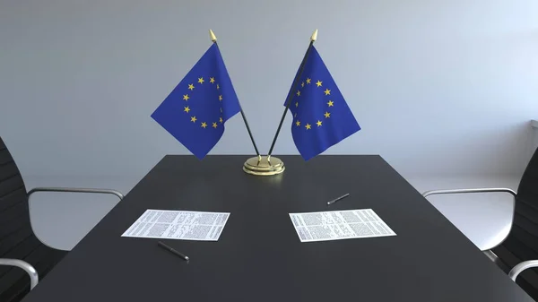 Flagi Unii Europejskiej i dokumentacją na stole. Negocjacji i podpisywania umowy. Konceptualna renderowania 3d — Zdjęcie stockowe