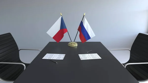 Bandeiras da República Checa e da Rússia e documentos em cima da mesa. Negociações e assinatura de um acordo internacional. Renderização 3D conceitual — Fotografia de Stock