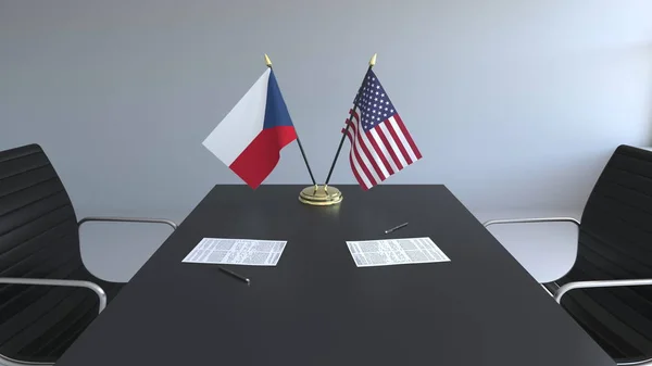 チェコ共和国とアメリカ合衆国とテーブルの上の論文のフラグです。交渉と国際協定に署名します。概念 3 d レンダリング — ストック写真