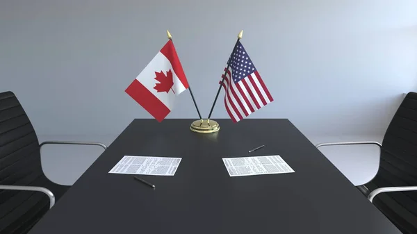 Σημαίες του Καναδά και των Ηνωμένων Πολιτειών και χαρτιά στο τραπέζι. Οι διαπραγματεύσεις και η υπογραφή μιας διεθνούς συμφωνίας. Εννοιολογική 3d rendering — Φωτογραφία Αρχείου