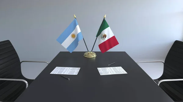Σημαίες, Αργεντινή και Μεξικό και χαρτιά στο τραπέζι. Οι διαπραγματεύσεις και η υπογραφή μιας διεθνούς συμφωνίας. Εννοιολογική 3d rendering — Φωτογραφία Αρχείου