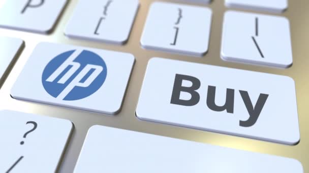Логотип компании HP и Купить текст на клавишах клавиатуры компьютера, редакционная концептуальная анимация — стоковое видео