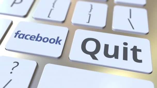 Tastaturet med FACEBOOK-logo og Quit-tekst på tastene. Redaksjonell animasjon – stockvideo