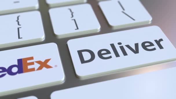 Fedex firmenlogo und liefern text auf den tasten der computer-tastatur, redaktionelle konzeptionelle animation — Stockvideo