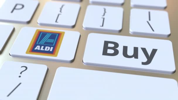 Клавіатура комп'ютера з логотипом Aldi та купити текст на клавішах. Редакційна анімація — стокове відео