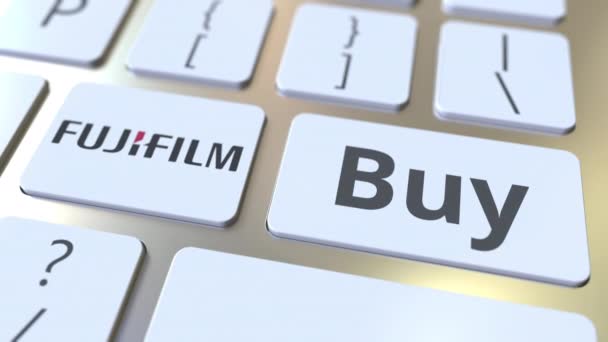 FUJIFILM logo aziendale e Acquista testo sui tasti della tastiera del computer, animazione concettuale editoriale — Video Stock