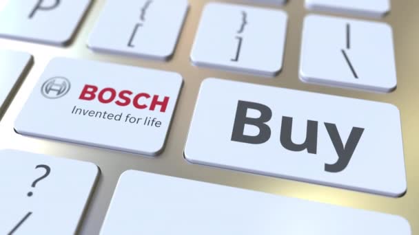 BOSCH company logo and Buy text on the keys of the computer keyboard, editorial conceptual animation — Stock Video