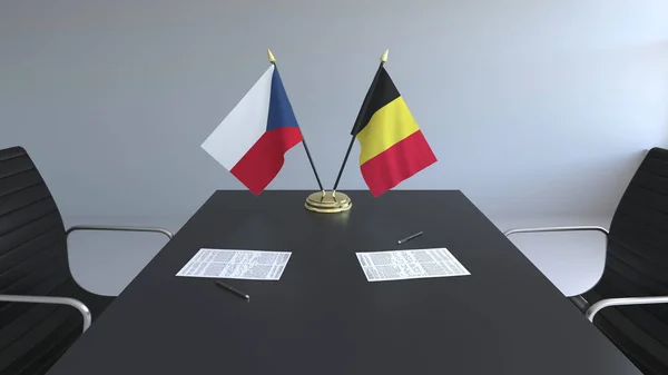 Flags of the Czech Republic and Belgium and papers on the table. Negotiations and signing an international agreement. Conceptual 3D rendering — Stock Photo, Image