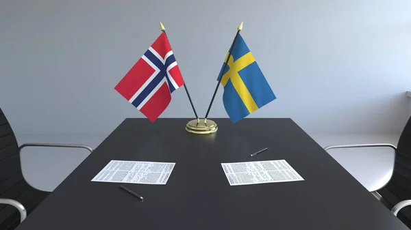 Flaggor av Norge och Sverige och papper på bordet. Förhandlingarna och underteckna internationella avtal. Konceptuell 3d-rendering — Stockfoto