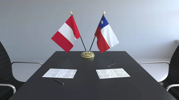 Bandeiras do Peru e Chile e papéis na mesa. Negociações e assinatura de um acordo internacional. Renderização 3D conceitual — Fotografia de Stock