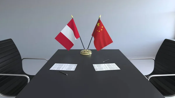 Bandeiras do Peru e da China e papéis na mesa. Negociações e assinatura de um acordo internacional. Renderização 3D conceitual — Fotografia de Stock