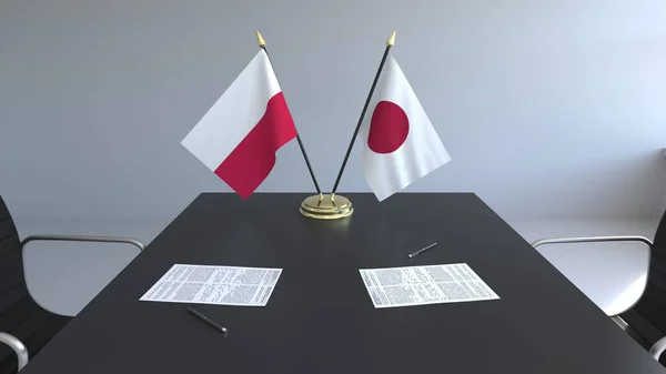 Bandeiras da Polônia e do Japão e papéis na mesa. Negociações e assinatura de um acordo internacional. Renderização 3D conceitual — Fotografia de Stock