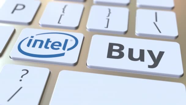 Intel şirket logosu ile klavye ve anahtarlar üzerinde metin satın alın. Editoryal kavramsal animasyon — Stok video