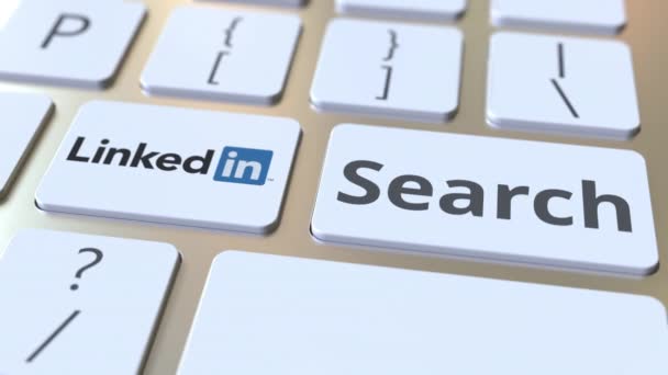 Computer keyboard with LINKEDIN logo and Search text on the keys. Editorial animation — Stock Video