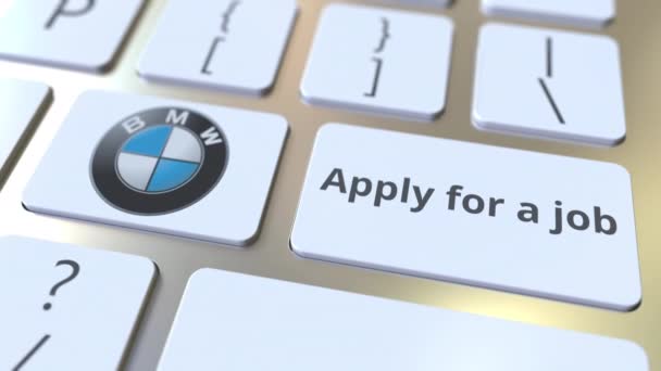 Computer keyboard with BMW logo and Apply for a job text on the keys. Editorial animation — Stock Video