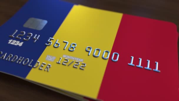 Plastic bank card featuring flag of Romania. Romanian national banking system related animation — Stock Video