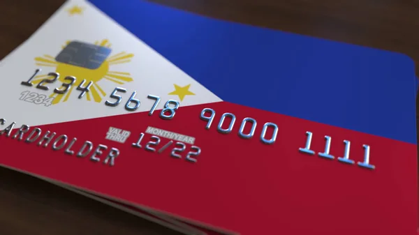 Tarjeta bancaria de plástico con bandera de Filipinas. Renderizado 3D relacionado con el sistema bancario nacional — Foto de Stock