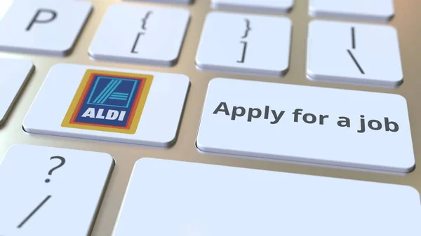 Logo de l'entreprise ALDI et Appliquer pour un texte de travail sur les touches du clavier de l'ordinateur, rendu 3D conceptuel éditorial — Photo